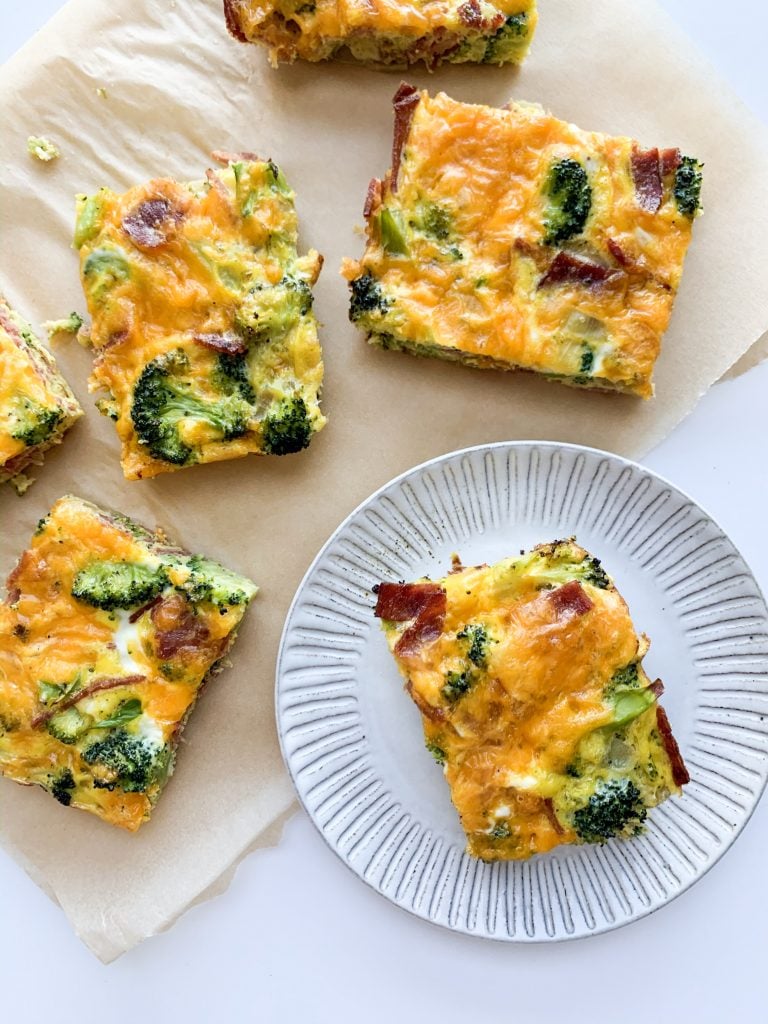 egg bake slices on parchment paper and one on a small plate