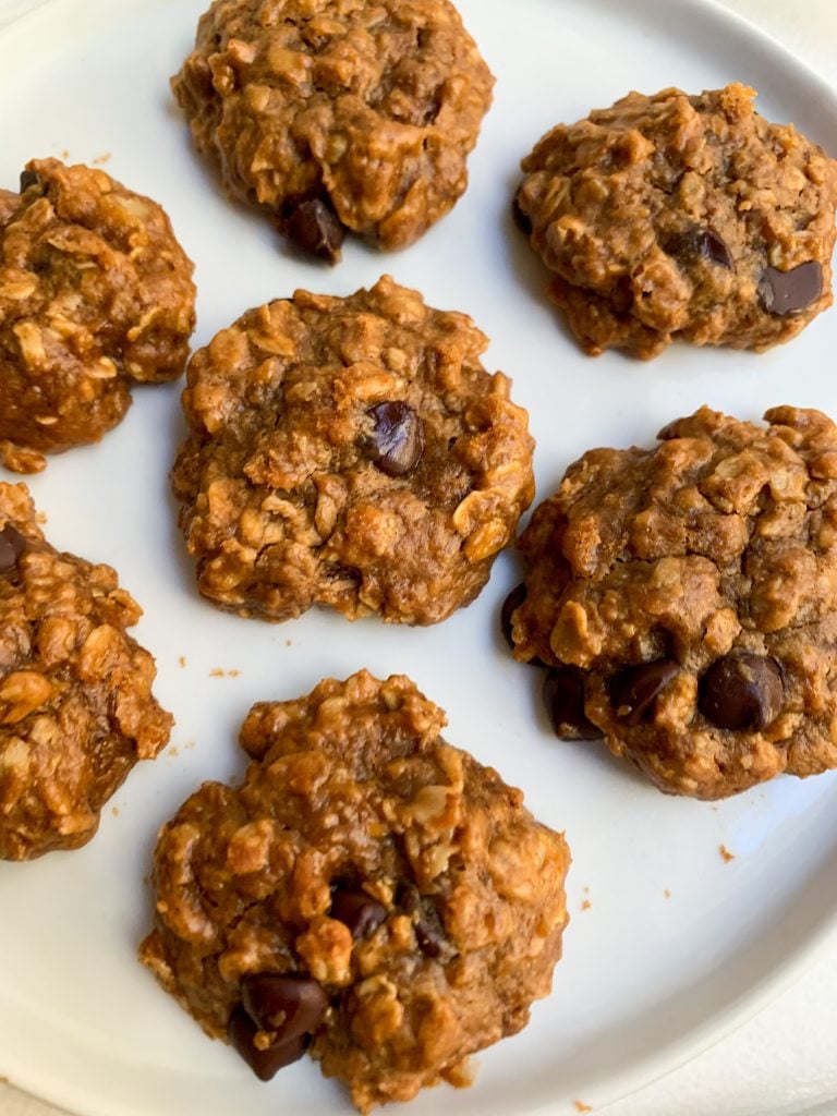 a white plate of Peanut Butter Chocolate Chip Oatmeal Cookies