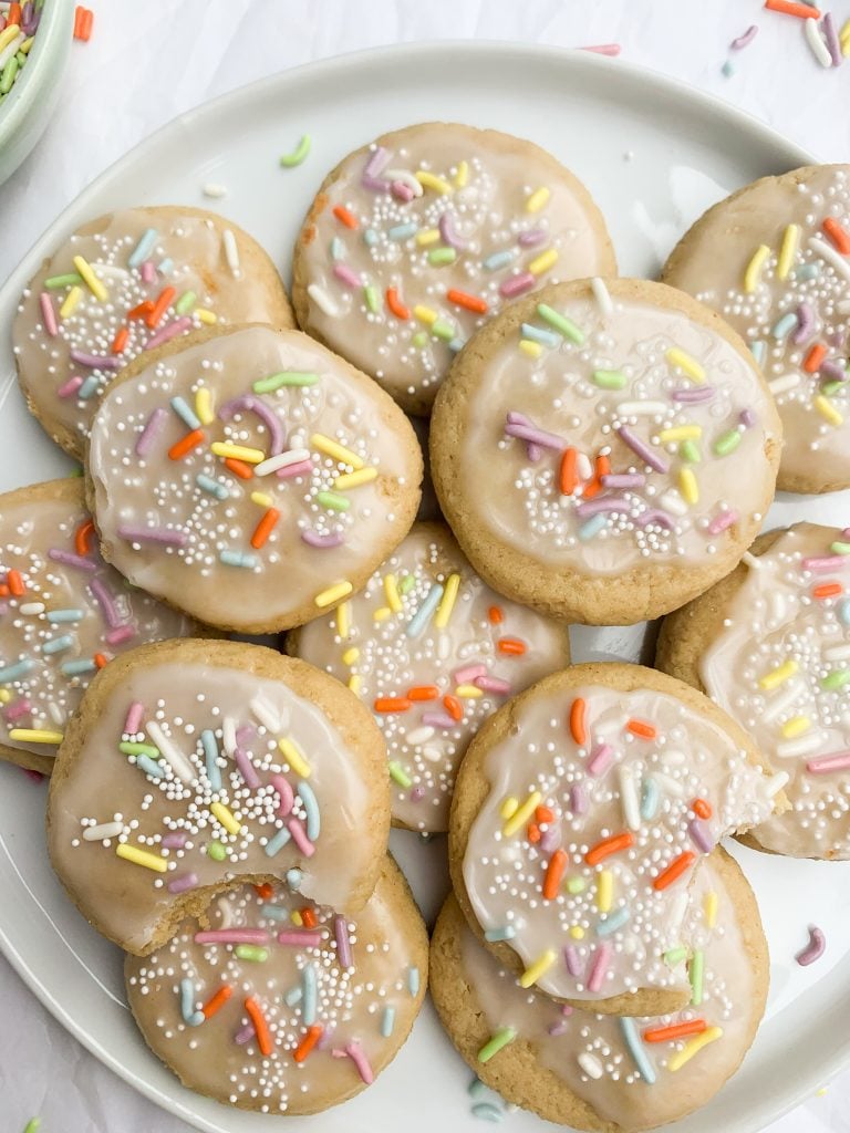 a white plate of gluten free sugar cookies