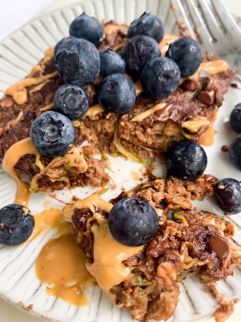 an oatmeal bake square with blueberries and peanut butter
