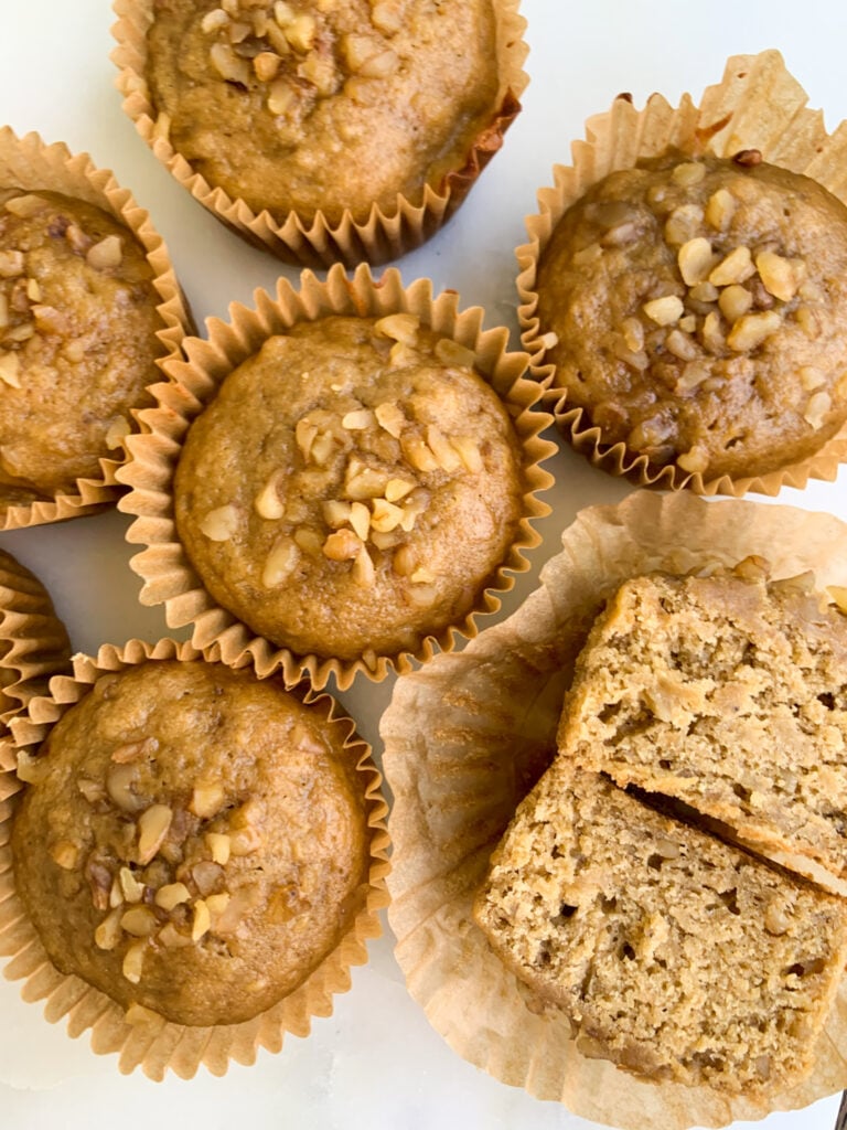 whole wheat banana muffins on a white background