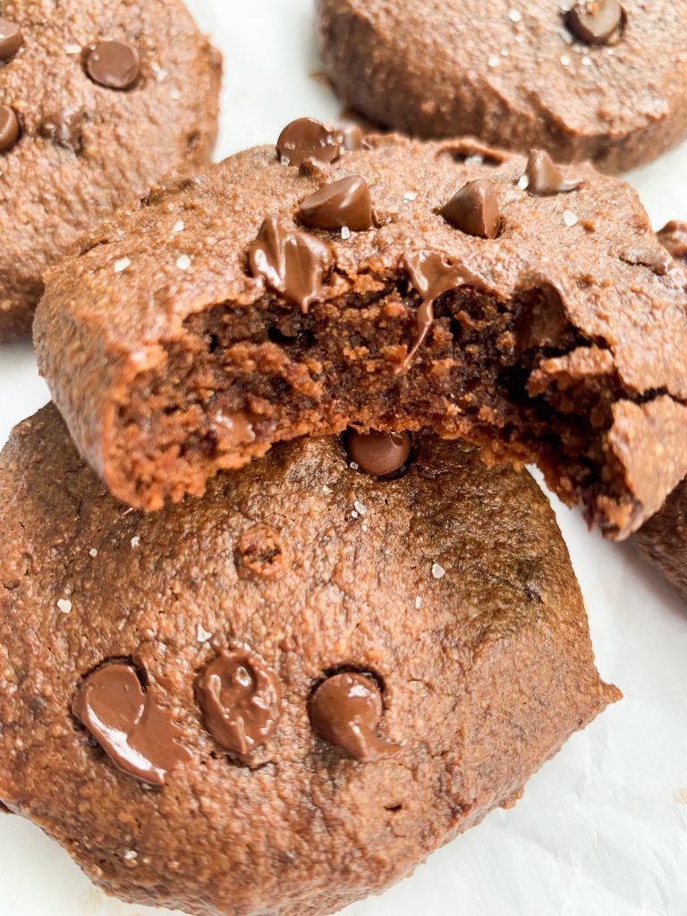a healthy double chocolate cookies with a bite taken out 