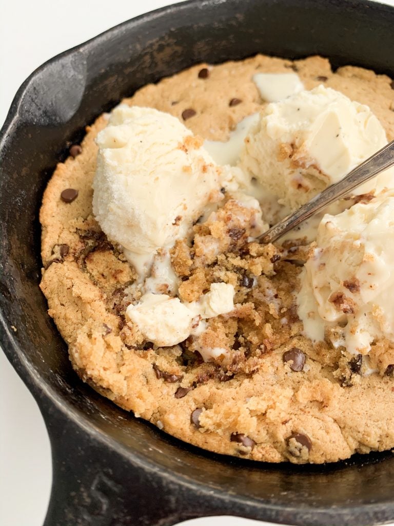 cookie skillet, vanilla ice cream, and spoon 