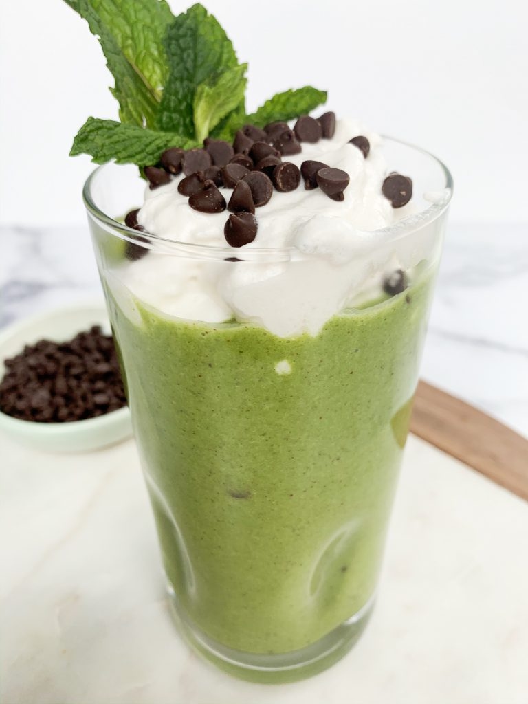 mint chip smoothie in a tall clear glass