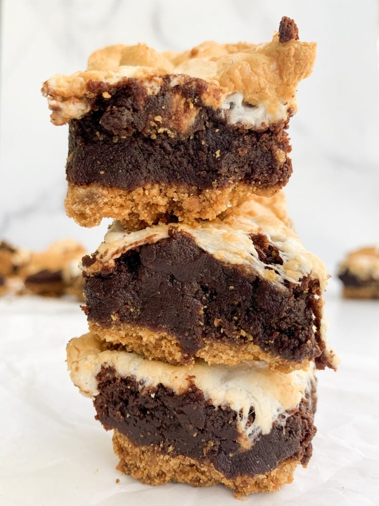 a stack of triple layered brownies