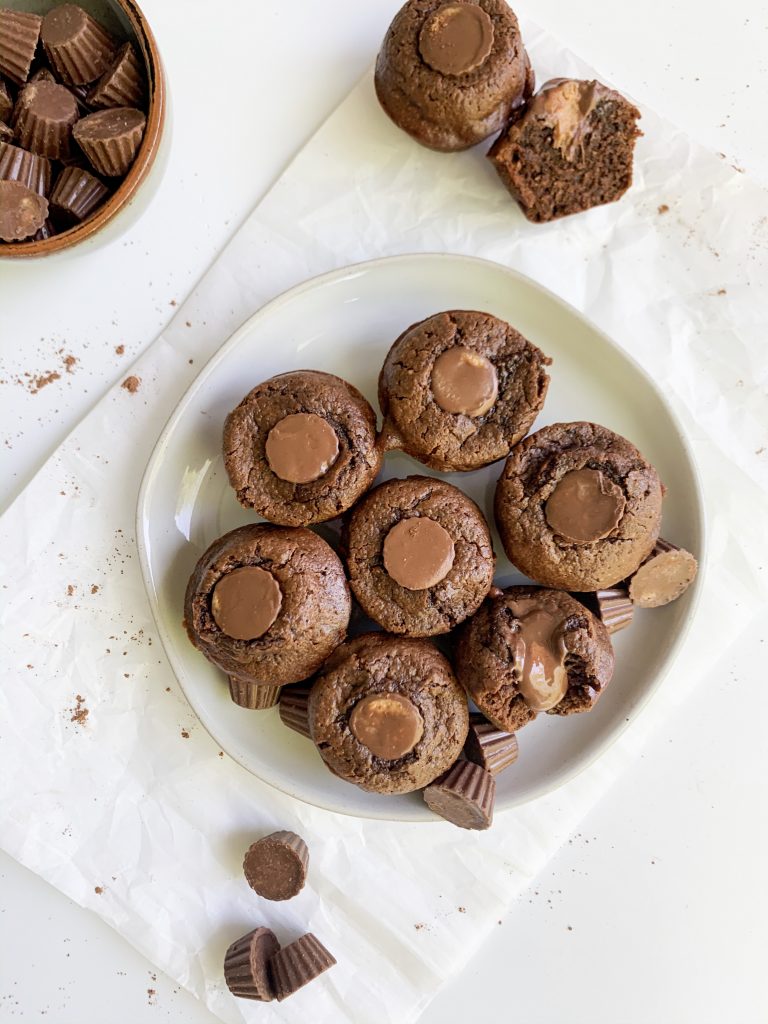a plate of peanut butter brownie bites on a white background