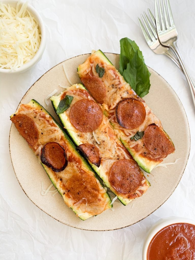 zucchini pizza boats on a plate 