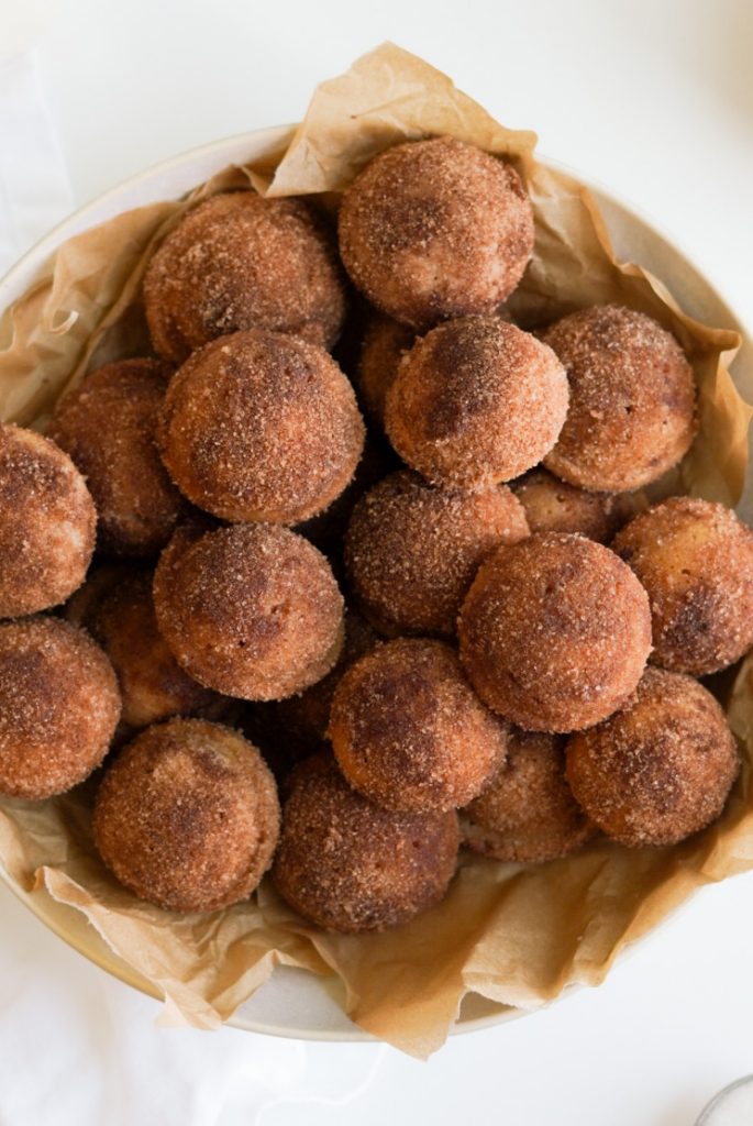apple cider donut holes in a bowl