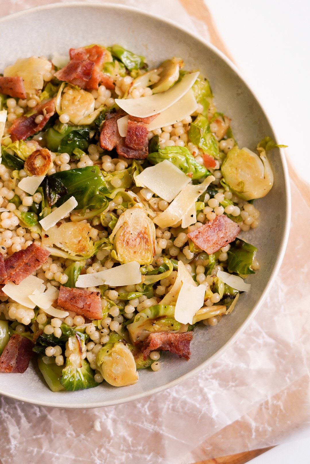 Warm Couscous & Brussels Sprout Salad Wellness by Kay