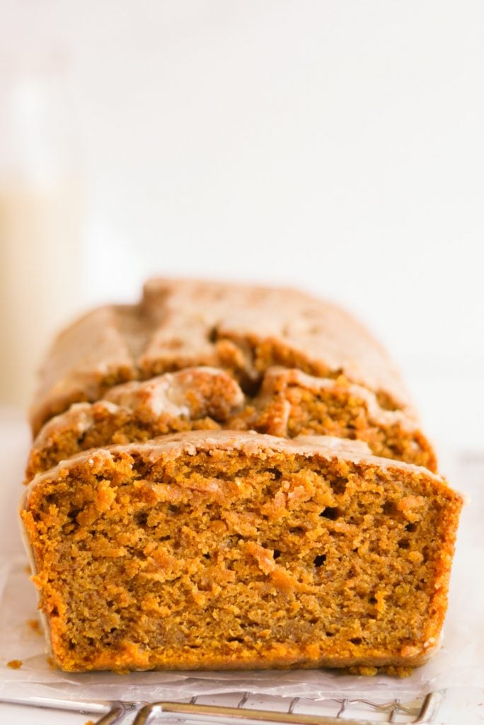 side on shot of a loaf of Easy Pumpkin Bread.