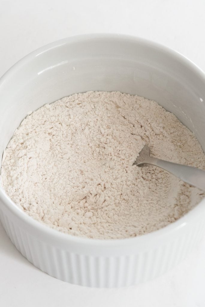 pumpkin bread dry ingredients in a mixing bowl