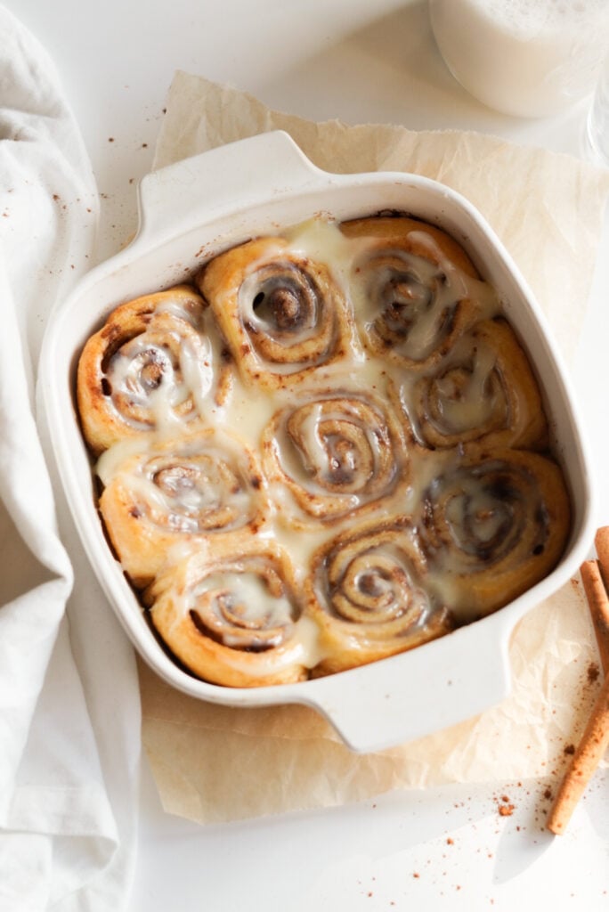 cinnamon rolls made out of crescent rolls in a white baking dish