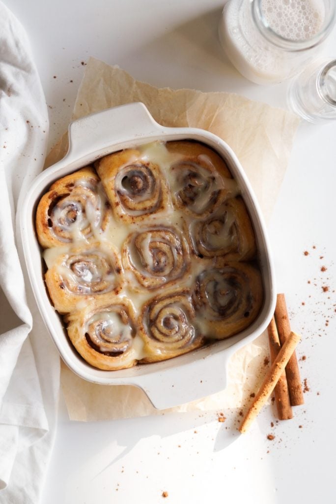 cream cheese glazed cinnamon rolls from crescent rolls in a baking dish