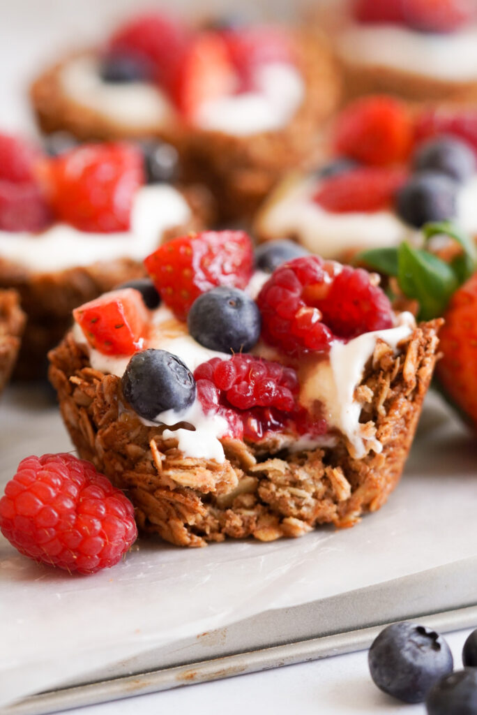 Breakfast Granola Cups filled with Yogurt and Berries