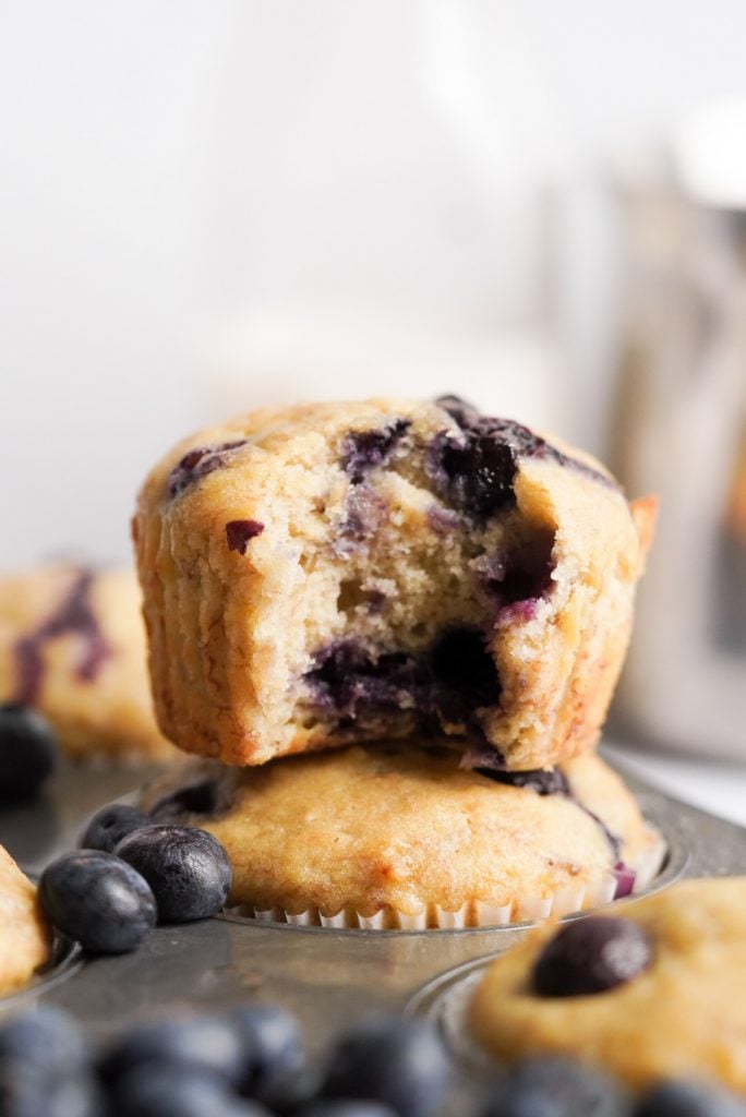 two stacked easy blueberry banana muffins