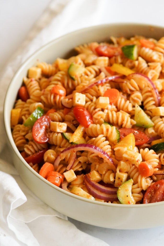 pasta salad with colorful vegetables in a large bowl