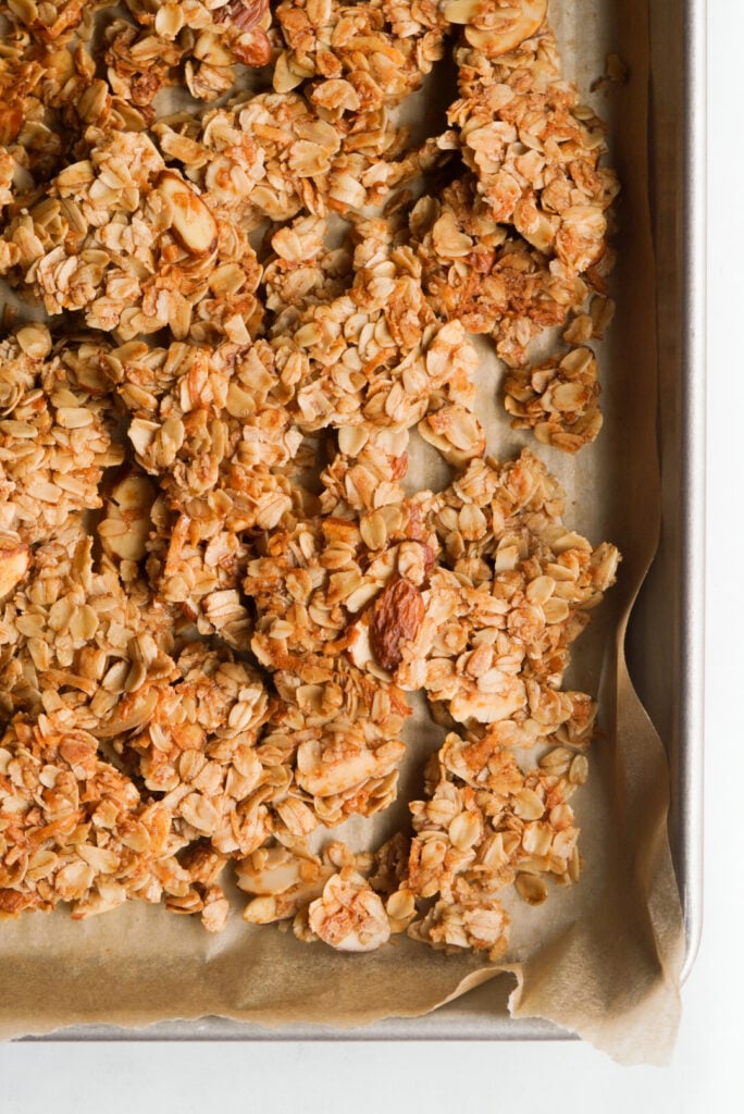 homemade granola clusters on a baking sheet