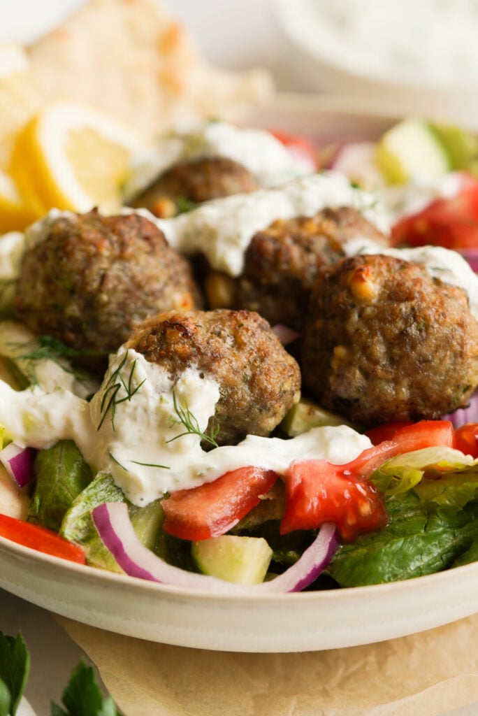 meatballs with a greek salad and tzatziki 