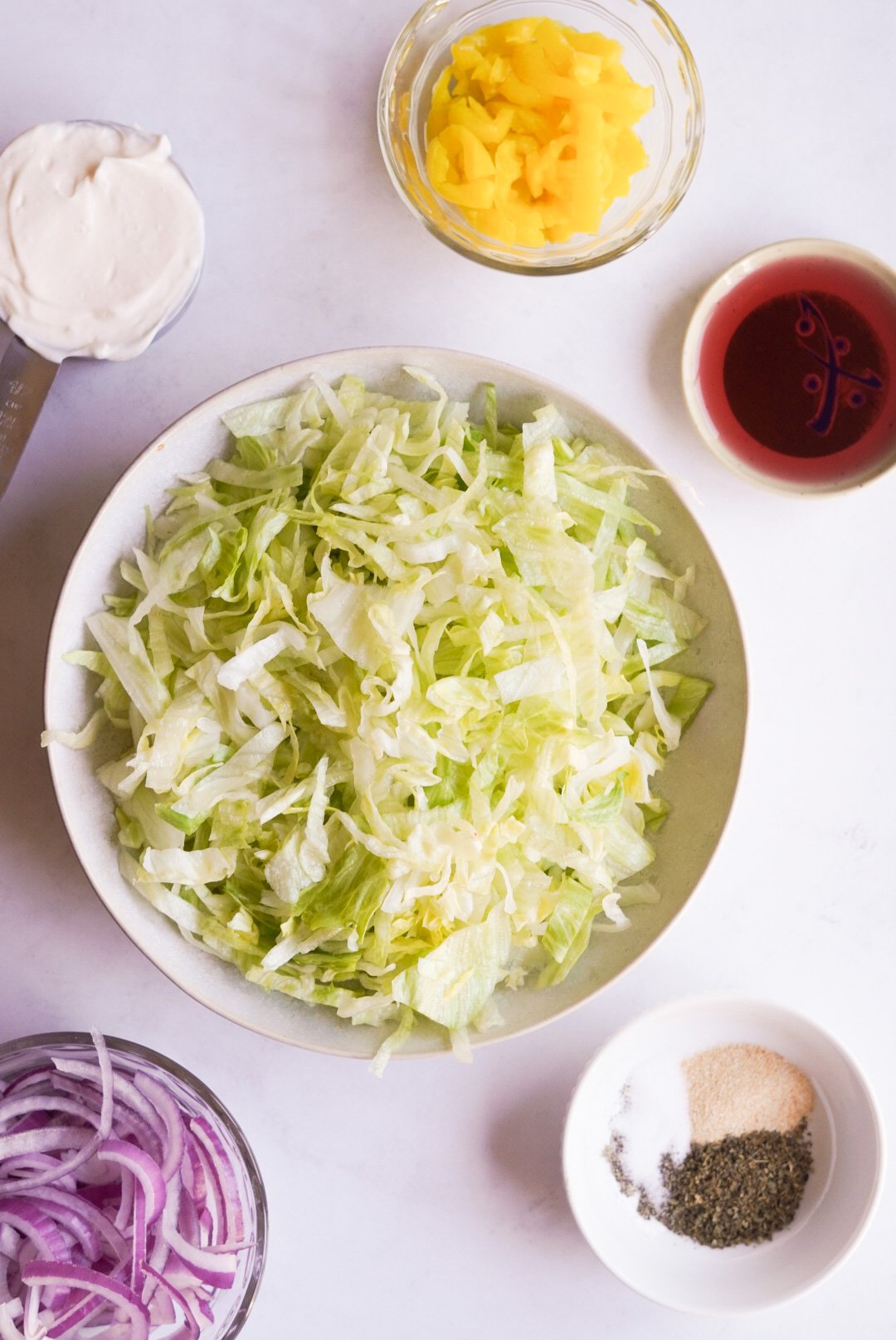 https://wellnessbykay.com/wp-content/uploads/2022/06/grinder-salad-ingredients.jpg