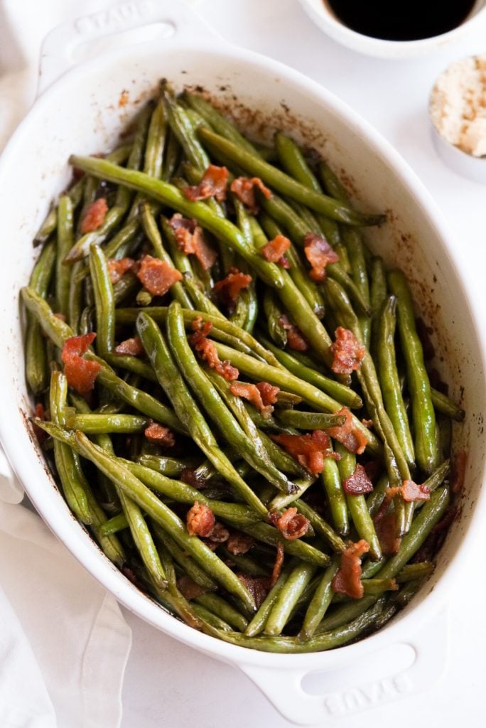green beans with bacon and sweet & savory glaze in a casserole dish