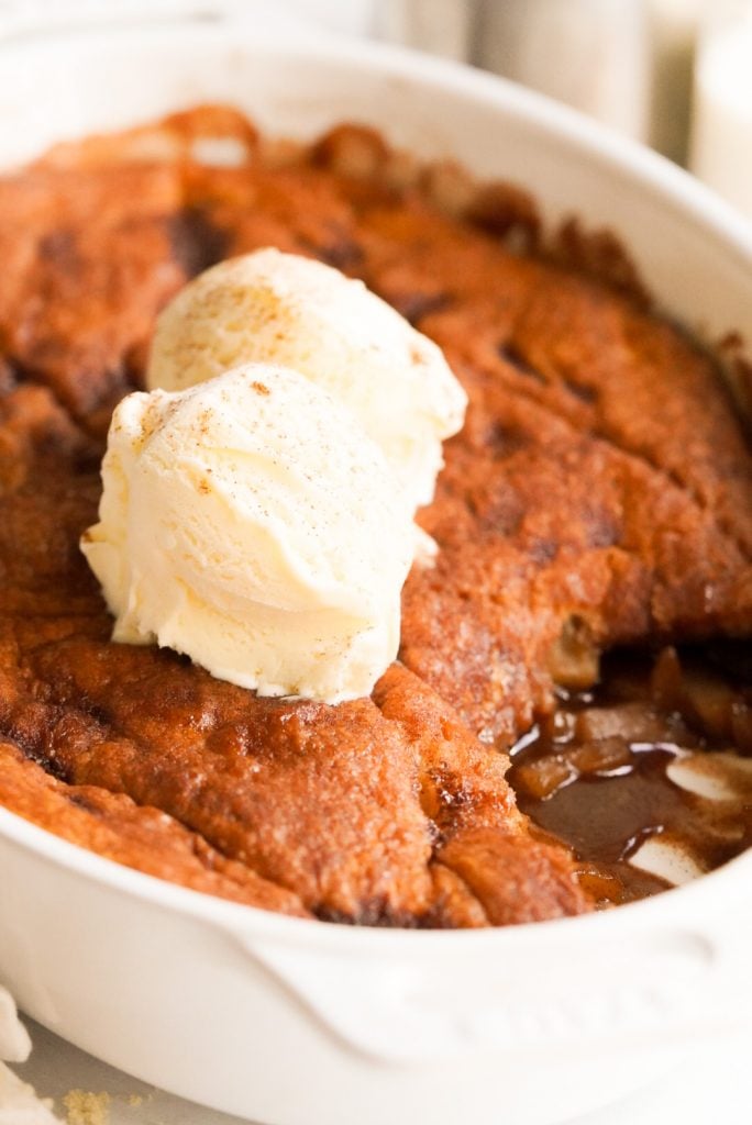 apple cobbler with crescent rolls topped with vanilla ice cream
