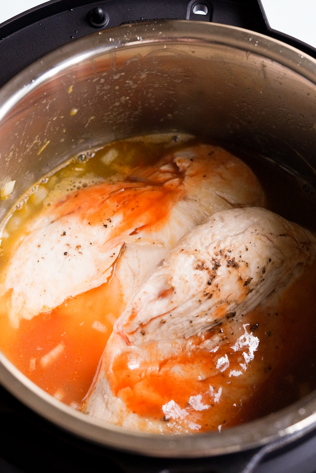 shredded chicken ingredients in instant pot before cooking