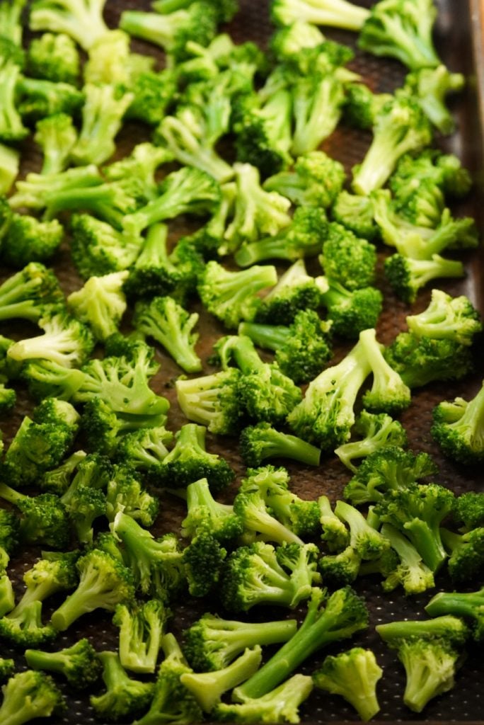 cooked broccoli on a baking sheet