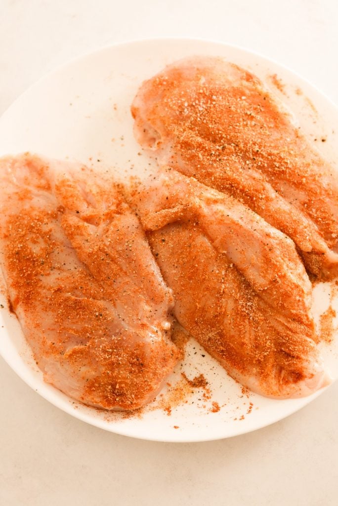 chicken breasts rubbed with seasonings and spices