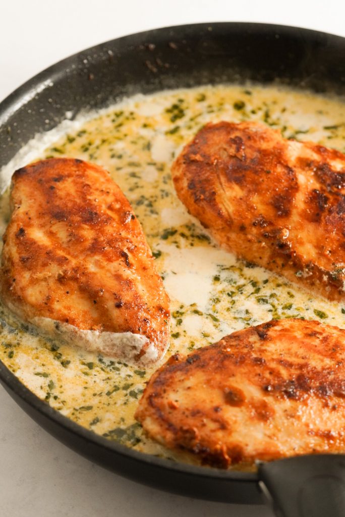 seared chicken breasts in a cream sauce