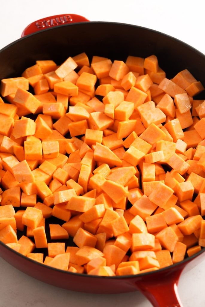 sweet potato cubes in a large skillet