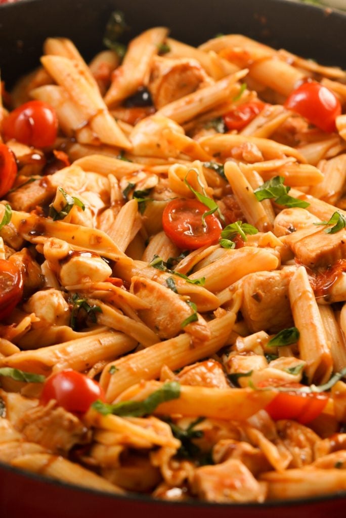 pasta with tomatoes, chicken, fresh basil, and fresh mozzarella