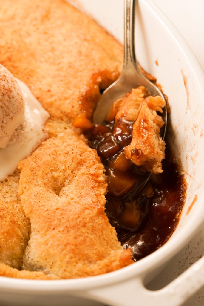 easy cinnamon peach cobbler made with crescent rolls