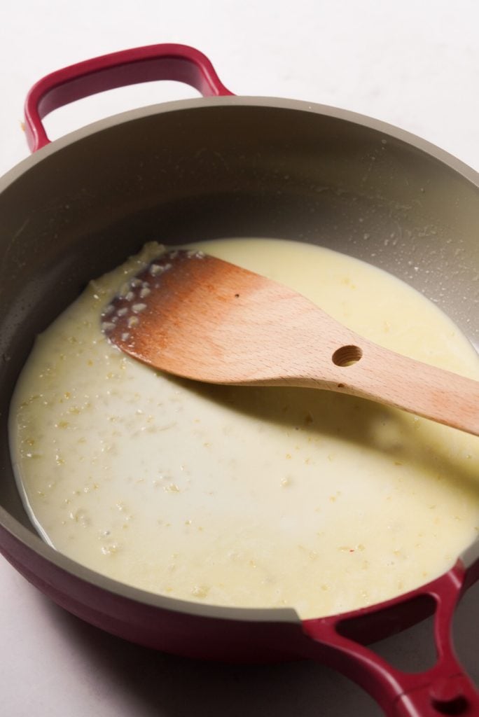 butter, garlic, and milk in a pan