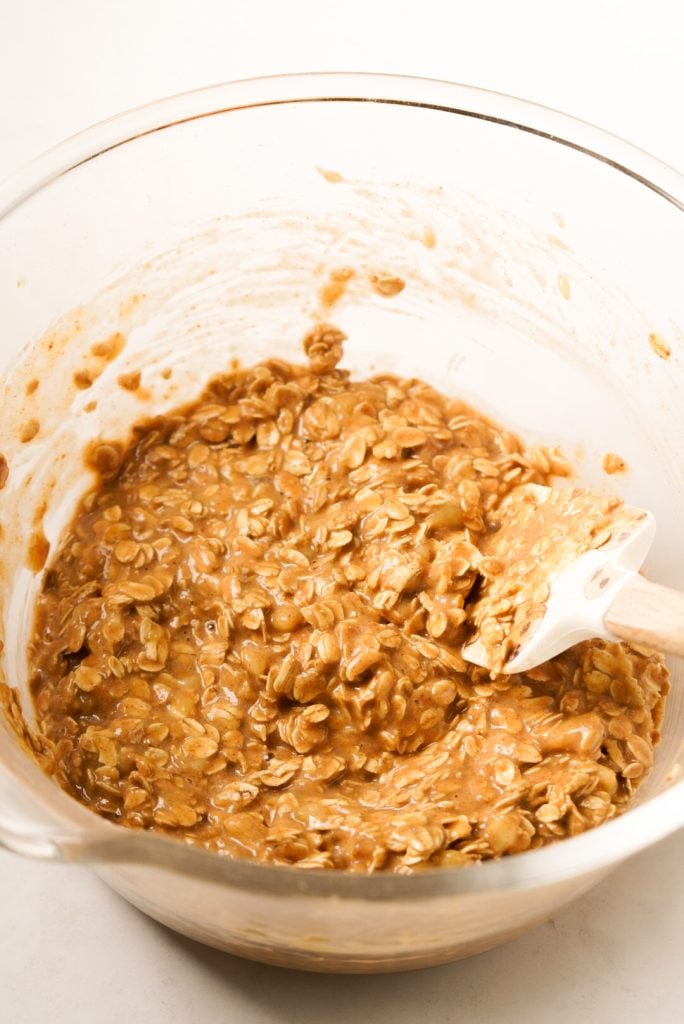 Mixing bowl with all of the oatmeal bar wet and dry ingredients combined