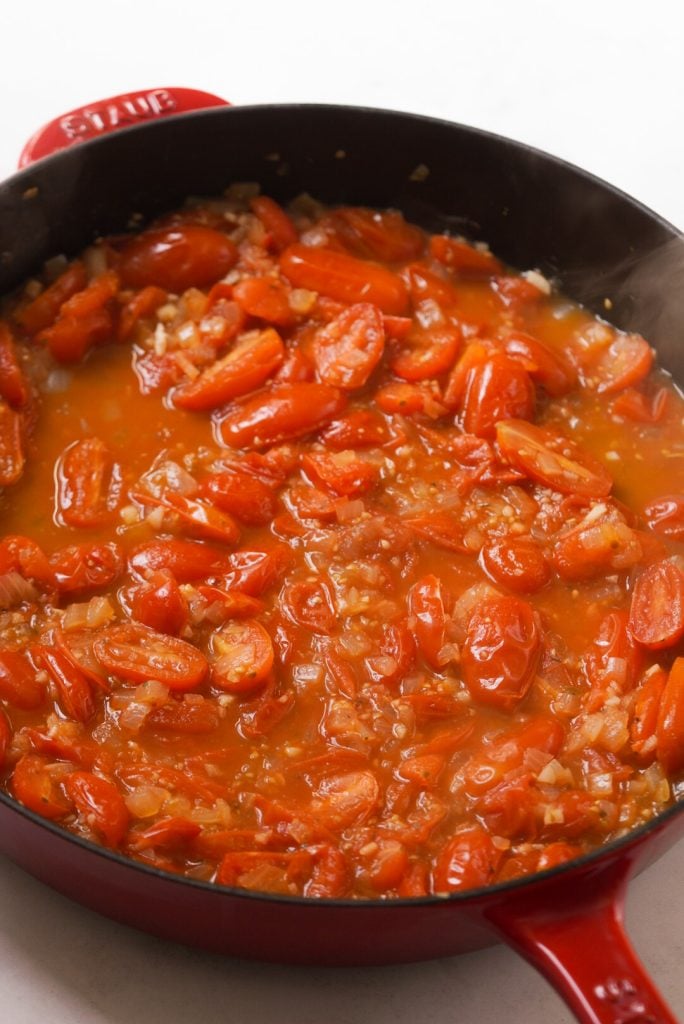 Italian pomodoro sauce simmering in a skillet.