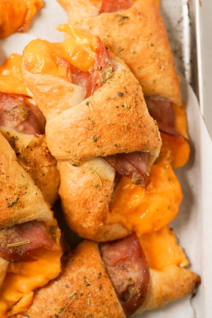 pile of cheese and ham crescent roll-ups