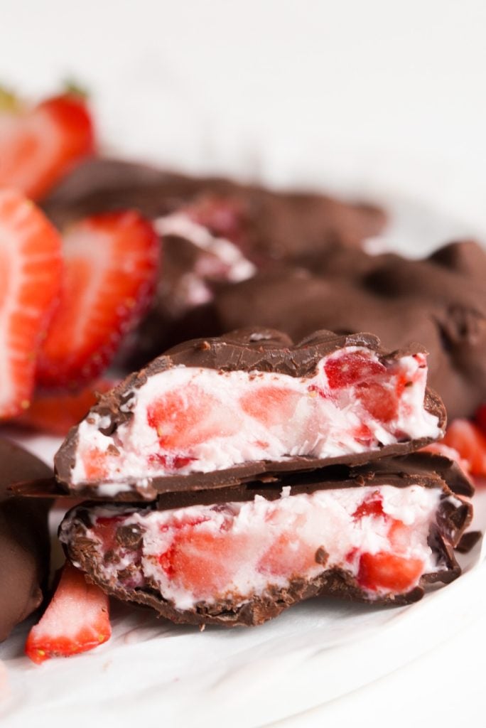 close up shot of a cut open chocolate strawberry yogurt cluster