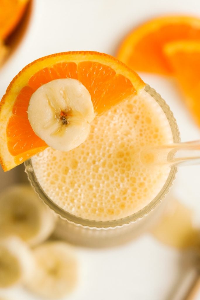 overhead shot of an orange banana smoothie