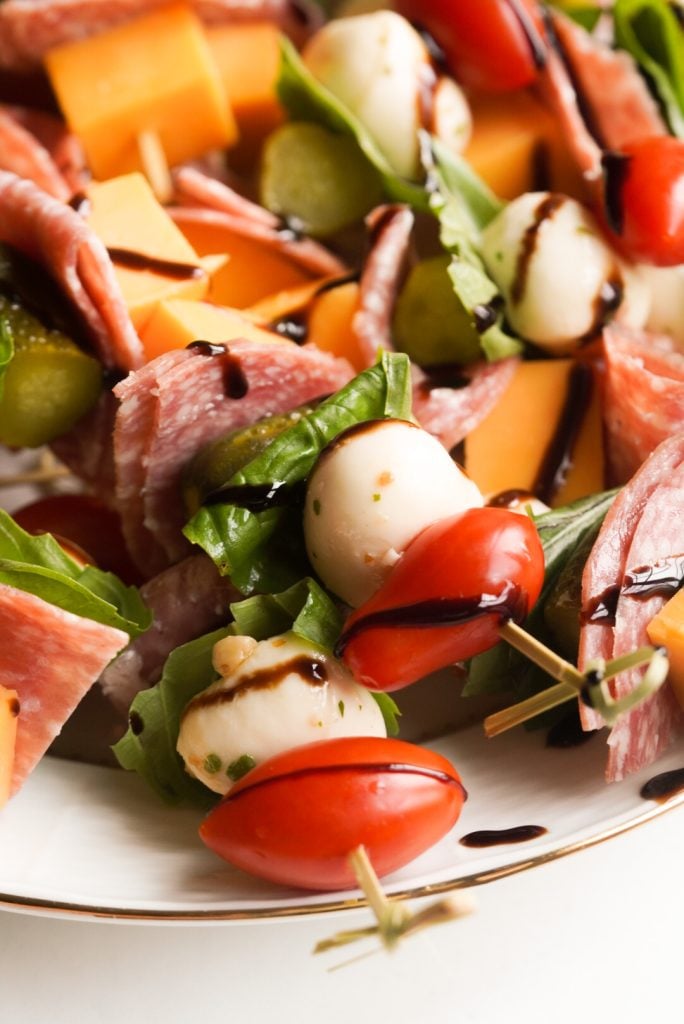 close up shot of meat and cheese skewers