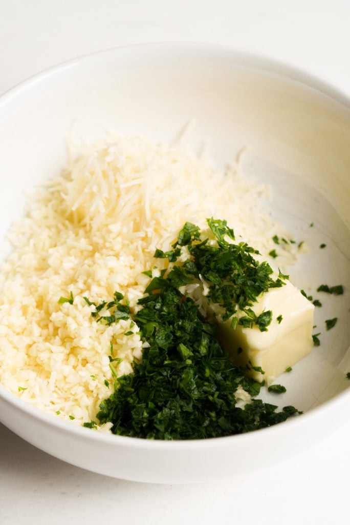 garlic butter ingredients added to a bowl.