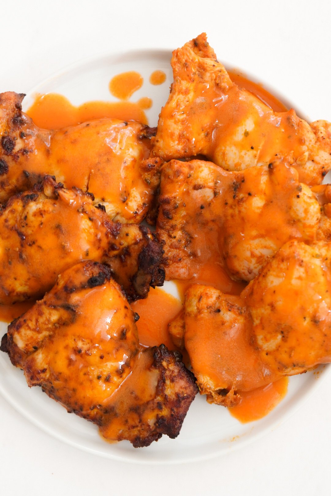 Buffalo Chicken Thighs (Air Fryer & Oven Baked) - Wellness by Kay