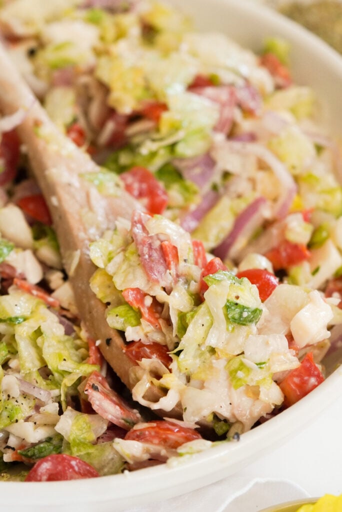 chopped salad with Italian meats, cheeses, and a creamy Italian dressing