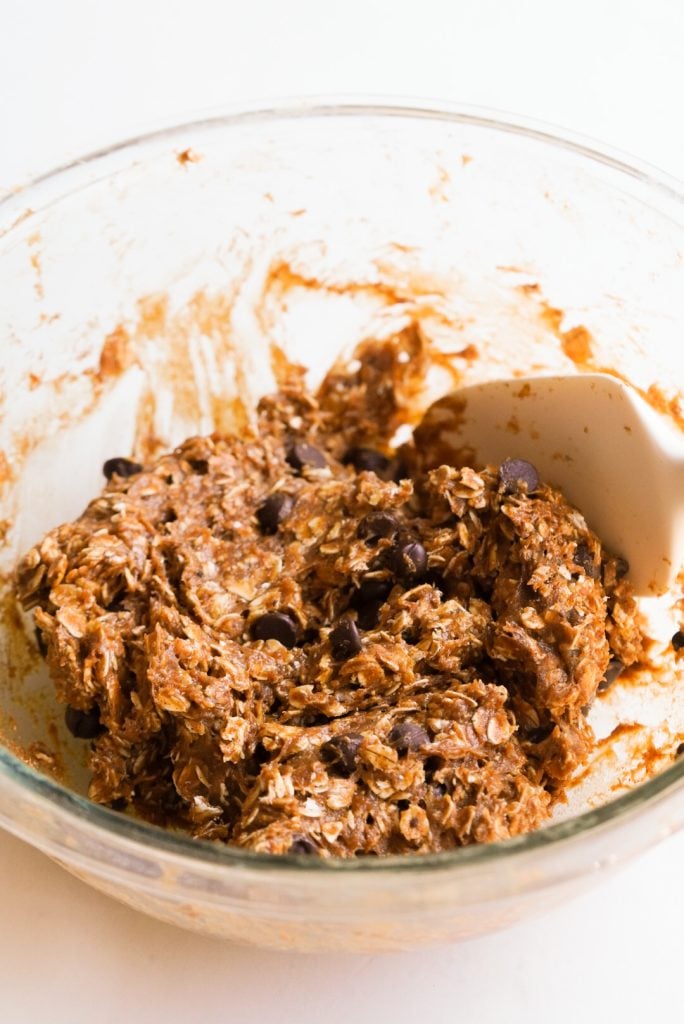 protein ball mixture with chocolate chips in a mixing bowl