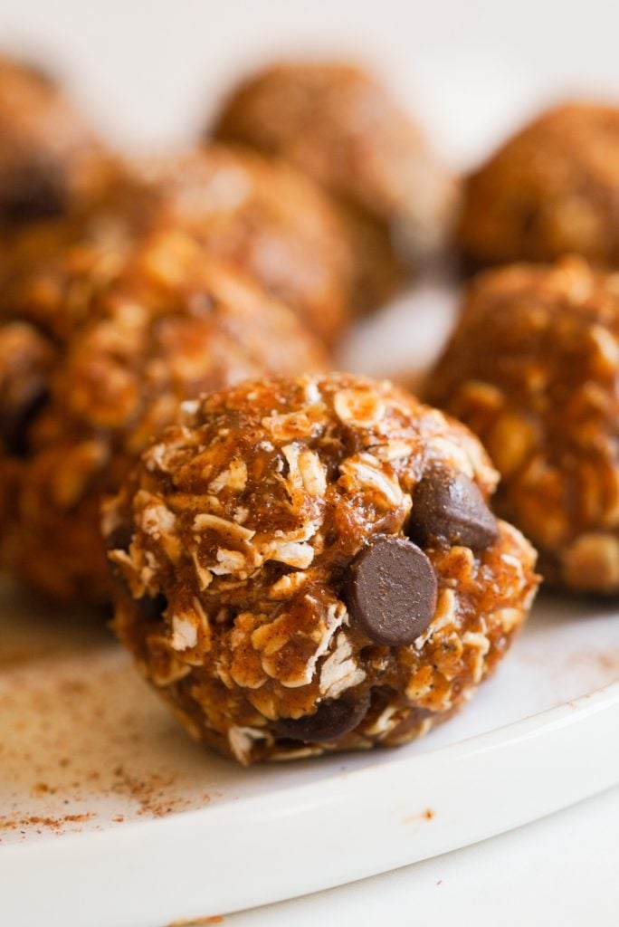 close up shot of a chocolate chip pumpkin energy ball