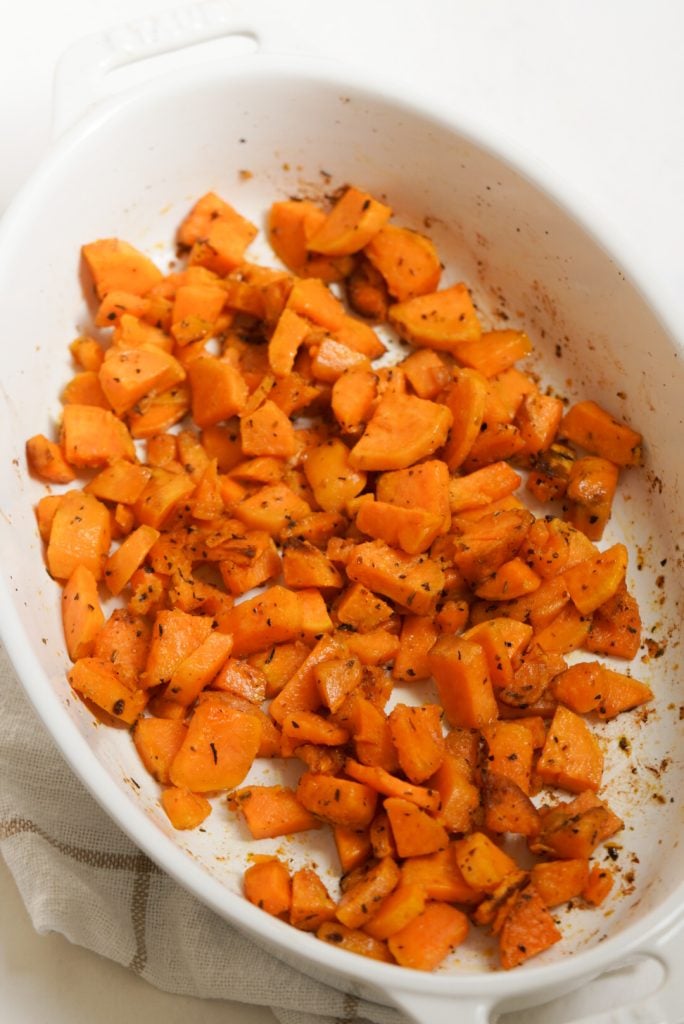 roasted sweet potatoes in a large baking dish 