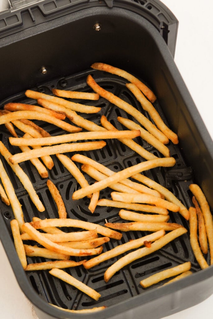 Frozen fast food style fries in the air fryer after cooking