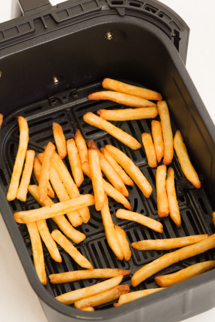 Frozen fries in the air fryer after cooking