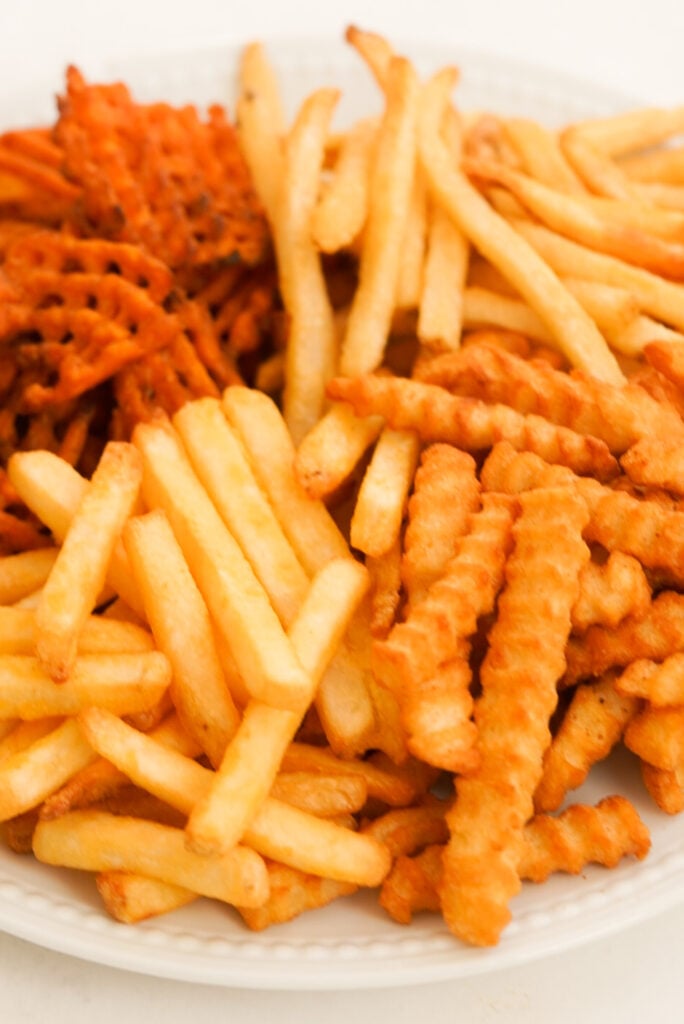 Plate of air fryer frozen french fries - with all different varieties!