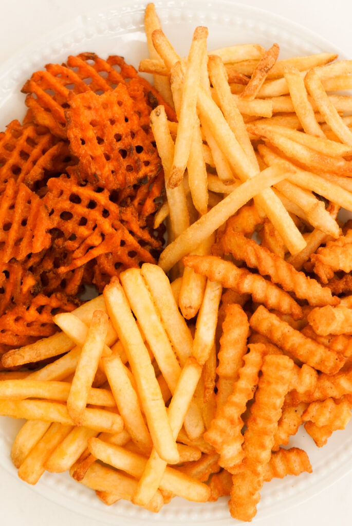 Plate of frozen fries prepared in the air fryer.