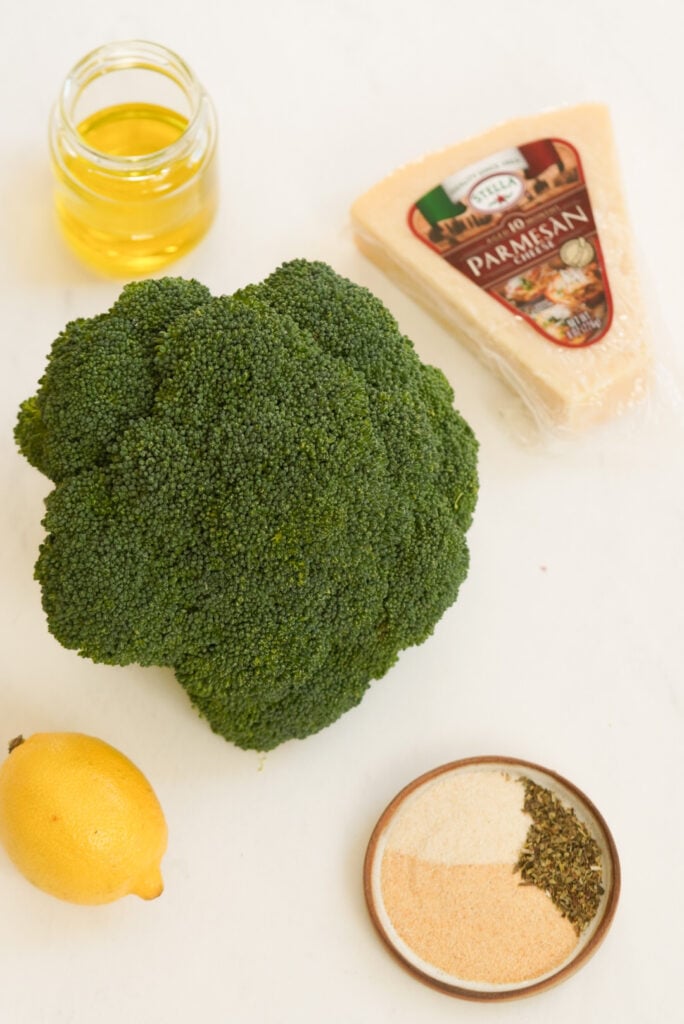 flat lay shot of ingredients needed to make parmesan smashed broccoli.
